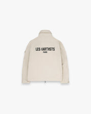 Windbreaker logo Essential Sand